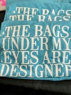 The bags under my eyes are designer t-shirt/designer t-shirt/snarky/sassy/funny/unisex shirt/funny gift/soft feel t-shirt