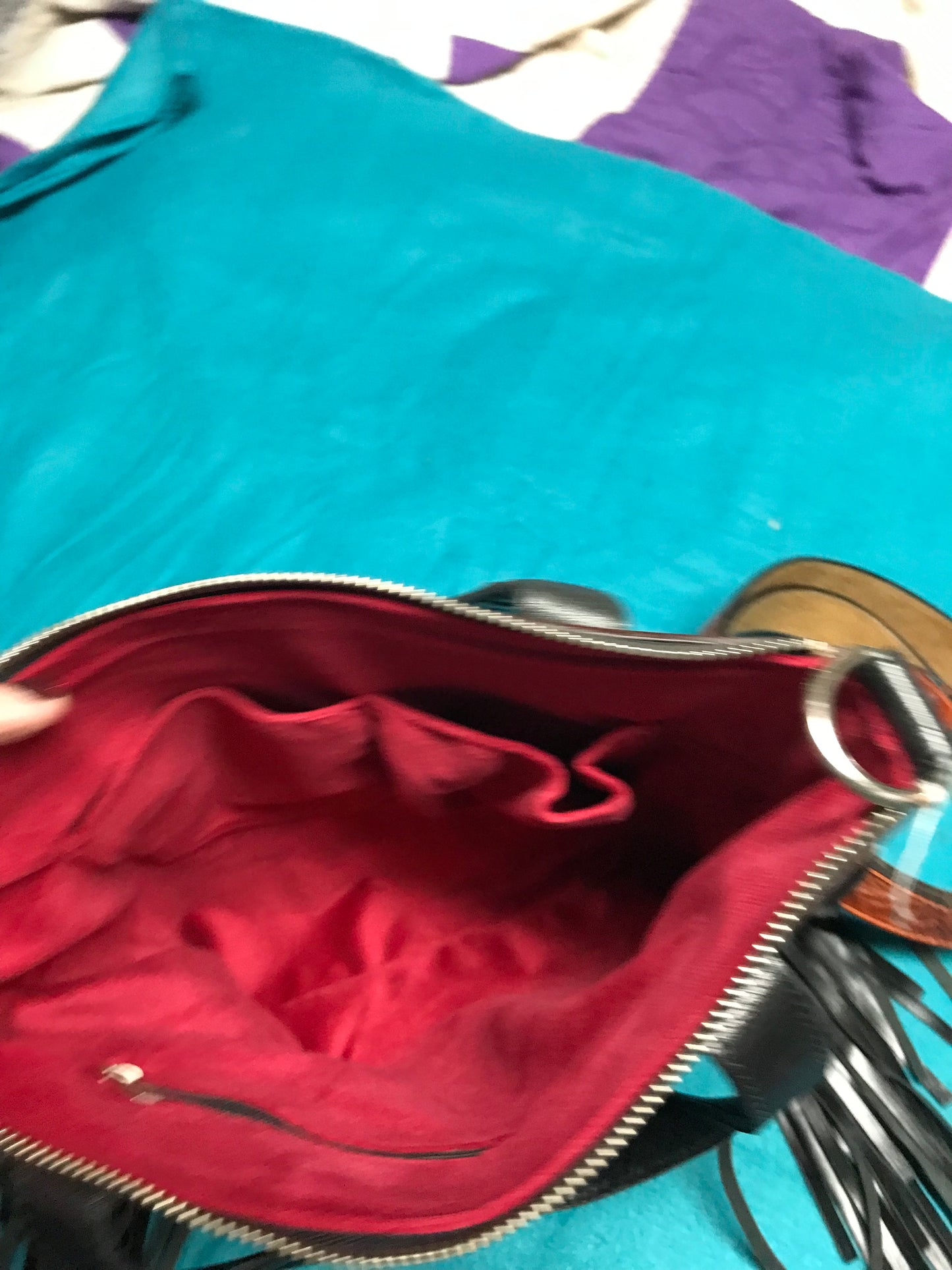 Black and white hid with brown leather trim purse